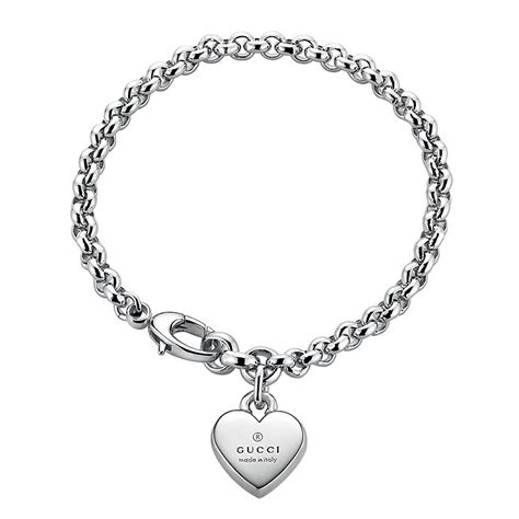 gucci trademark sterling silver heart motif bracelet|Gucci trademark heart silver bracelet.